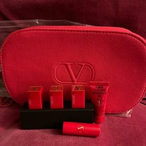 Valentino makeup bag and 4 lipstick minis